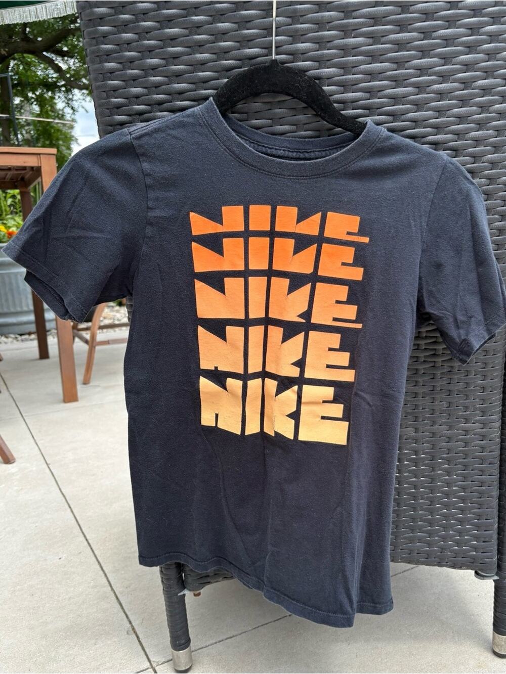 Nike Boys Black Tee with Orange-to-Yellow Stacked Logo- size M